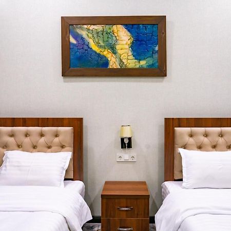 Macan Terrace Hotel Tasken Kültér fotó