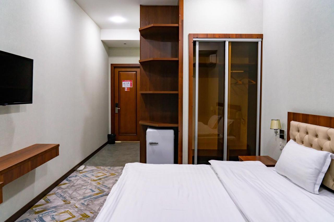 Macan Terrace Hotel Tasken Kültér fotó
