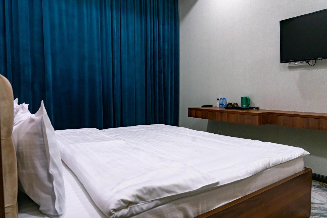 Macan Terrace Hotel Tasken Kültér fotó